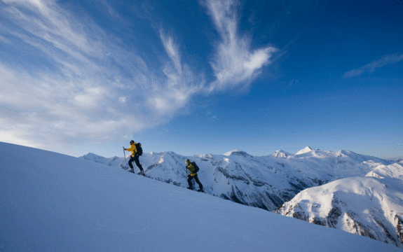 Two ski tourers in deep snow